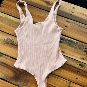 Kittenish Pink ribbed bodysuit